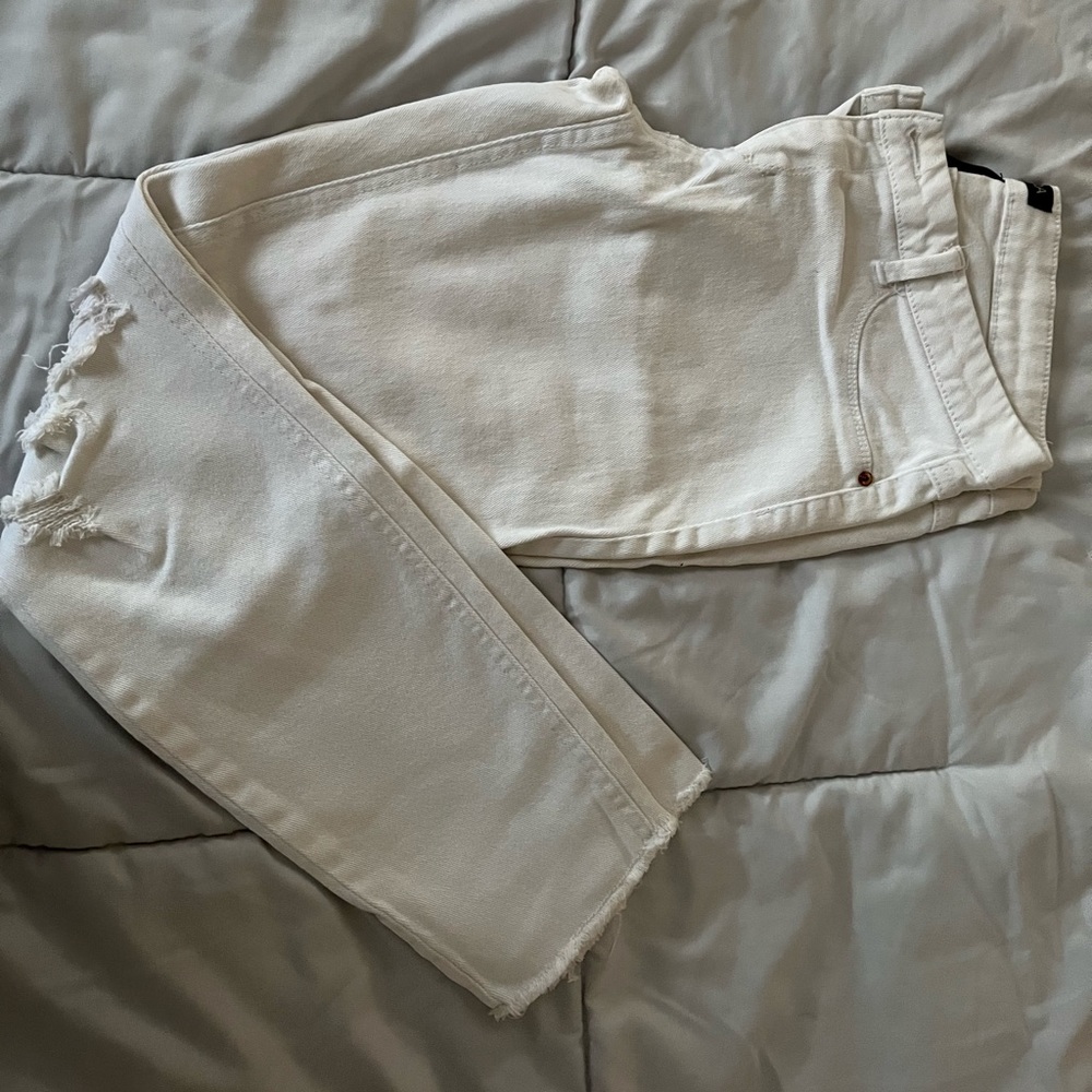 White distressed skinny jeans from Generra